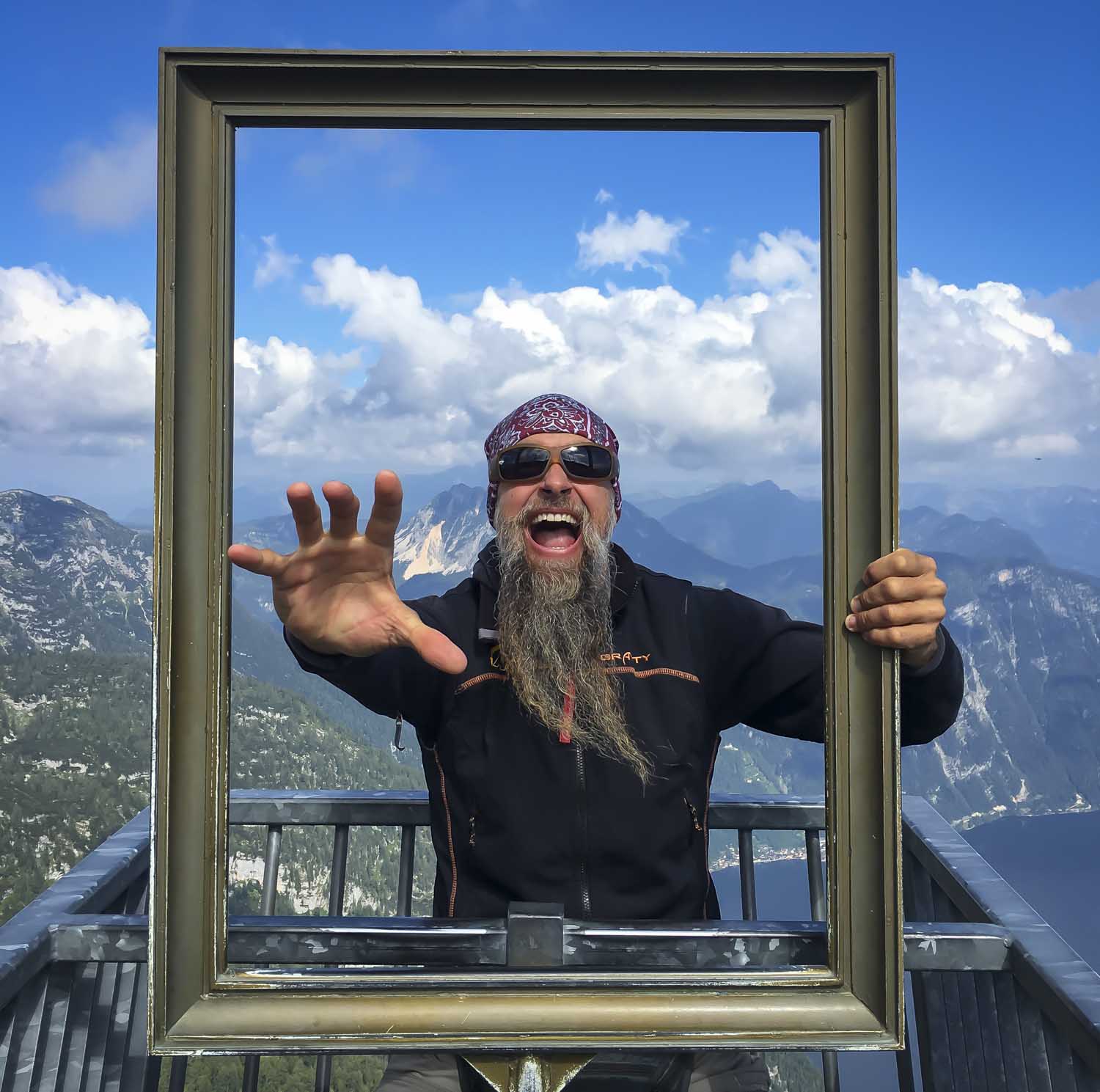Portrait of wildlife photographer Jens Cullmann at a mountain overlook